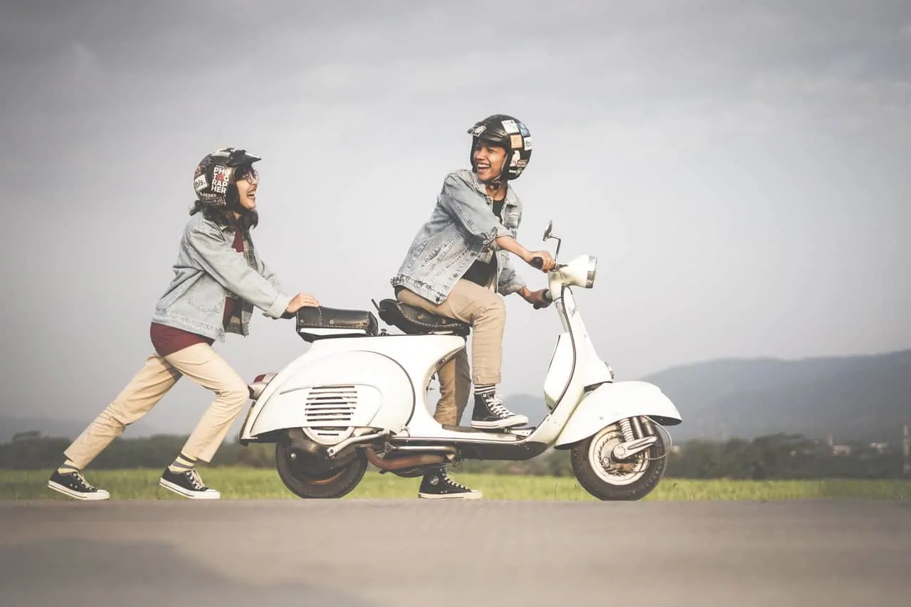 couple helmets scooter