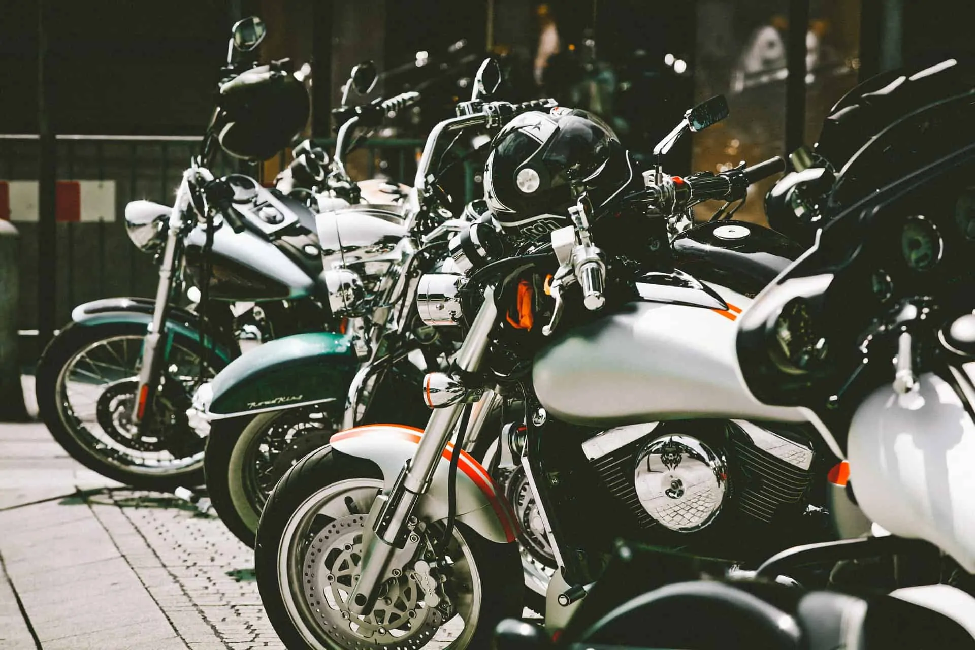 parked motorcycles helmets