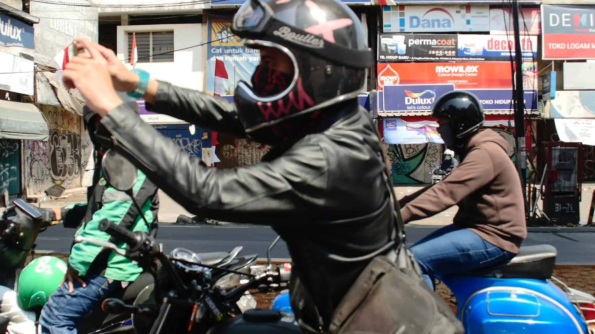 man stretching arms helmet