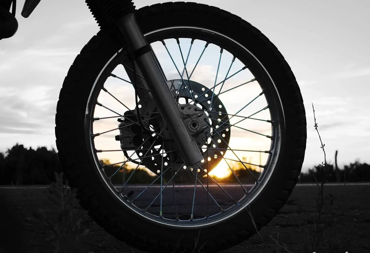 tire motorcycle sunset